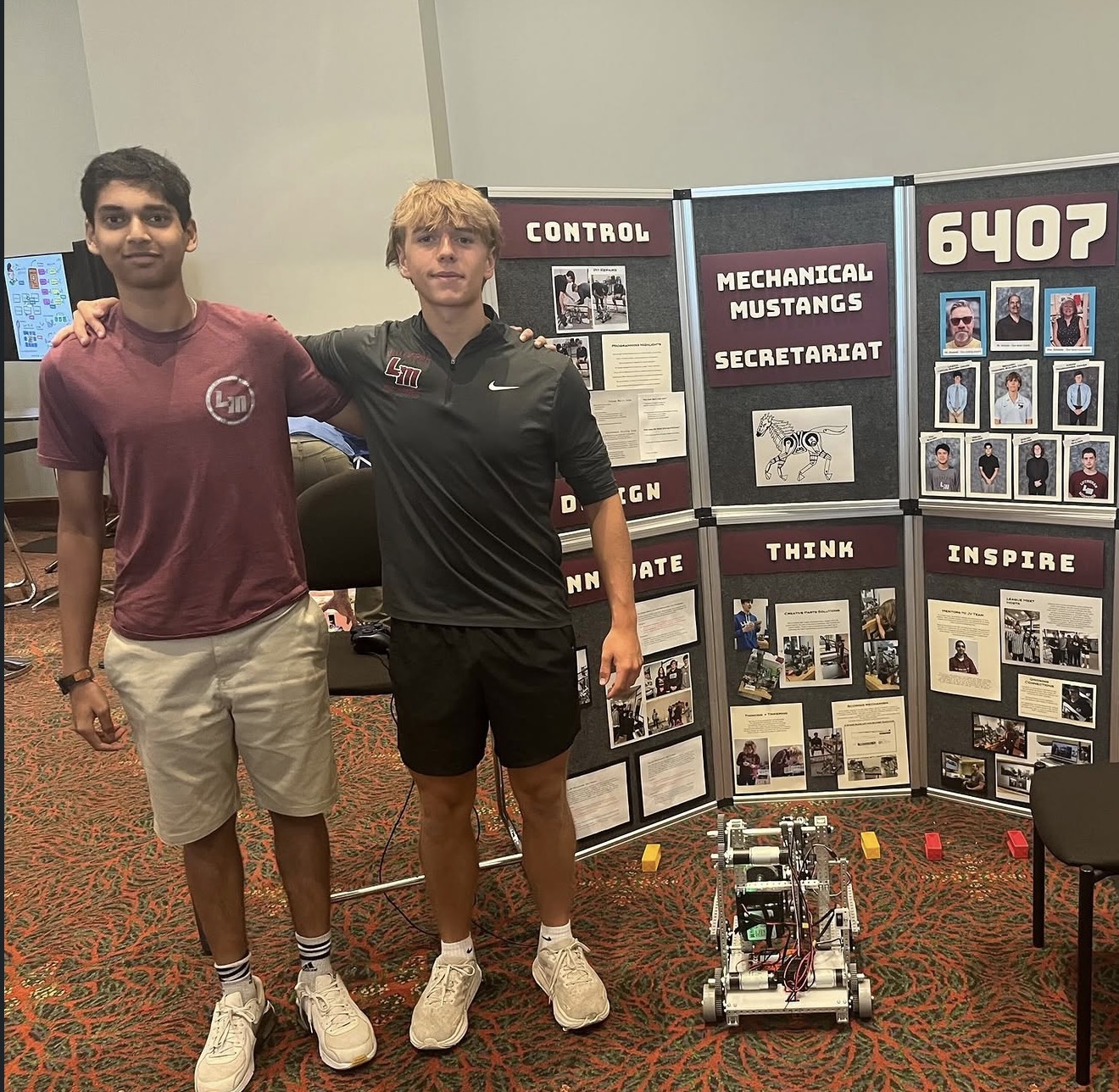 Rehan Raj and Ben presenting their robotics team's robot to attendees at the ISTE conference in San Antonio